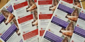 An image showing a fan of sheets of tickets for multiple events before they are cut down