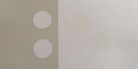 Image of round pre cut stickers showing where they have been peeled from the backing sheet