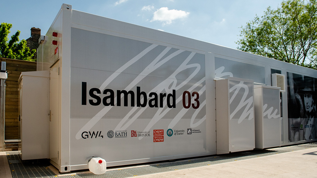 A shipping container-sized supercomputer called Isambard 3 sits outside onsite