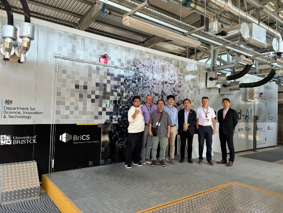 RIKEN and BriCS colleagues stood outside Isambard-AI