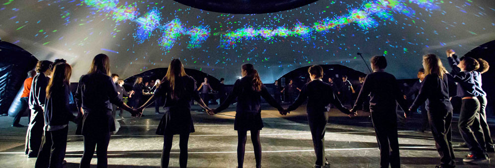 Schoolchildren participating in danceroom Spectroscopy (dS), an interactive visualisation of molecular dynamics.