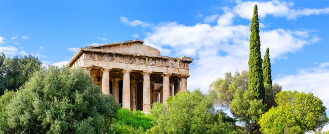 an ancient greek style building with pillars and a triangular roof