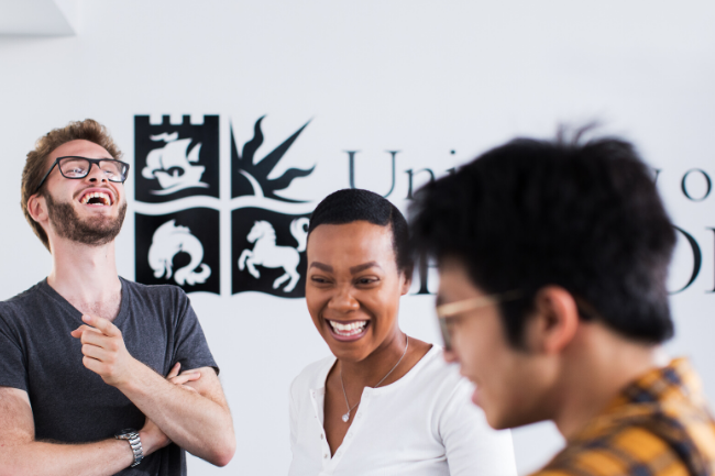 University of Bristol students laughing together in Beacon House