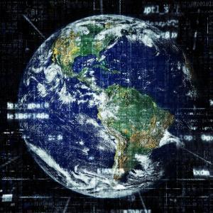 The Earth from space with digital text overlay.