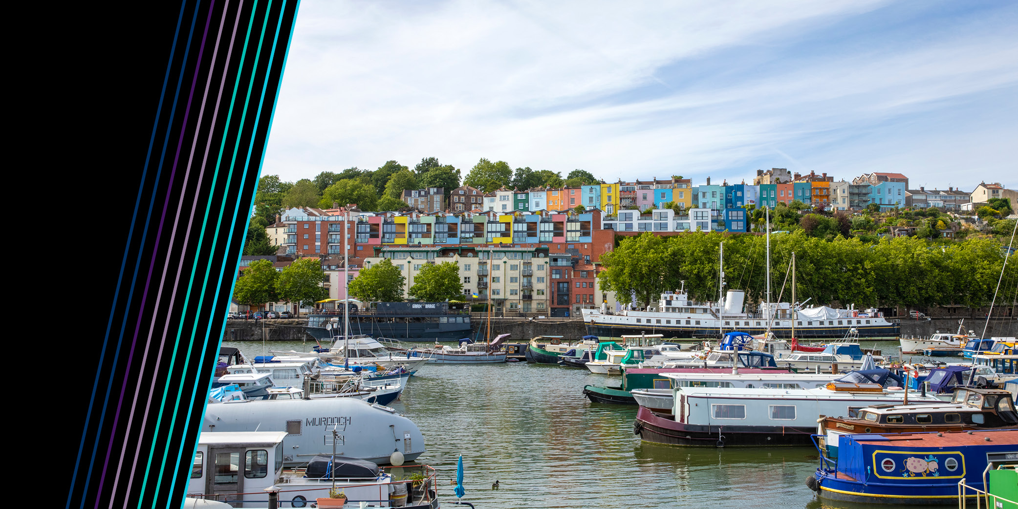 Bristol harbourside with boats and colourful houses