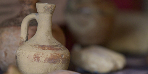 A close up of some clay pots.