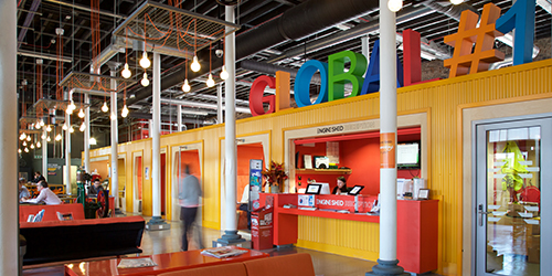 A colourful reception area at The Engine Shed in Bristol.