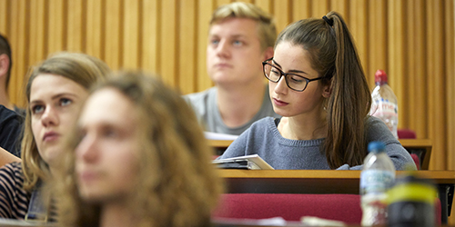 Students in a lecture hall.