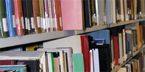 a photograph of shelves of books in a library